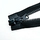 Molded plastic zipper